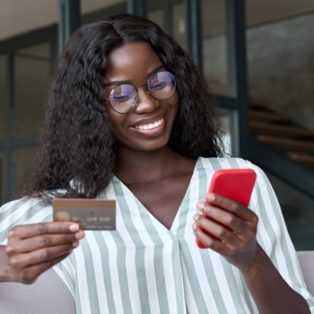 Happy,Young,Black,African,Woman,Customer,Shopper,Holding,Credit,Card