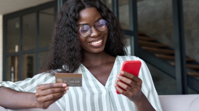 Happy,Young,Black,African,Woman,Customer,Shopper,Holding,Credit,Card