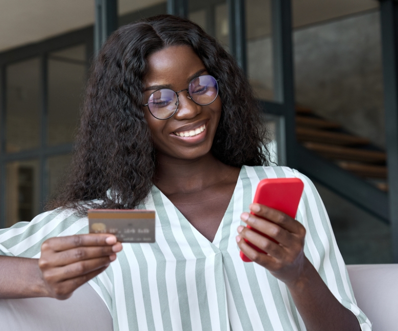 Happy,Young,Black,African,Woman,Customer,Shopper,Holding,Credit,Card