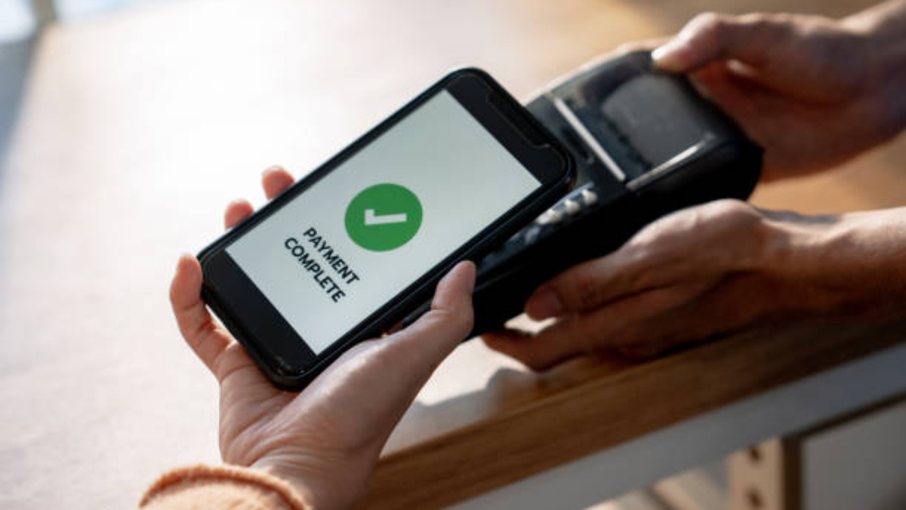 Customers use their phones to scan to pay.